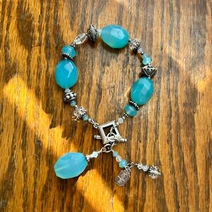 Tres Jolie Accessories Blue and Silver Bracelet with Cross Charm